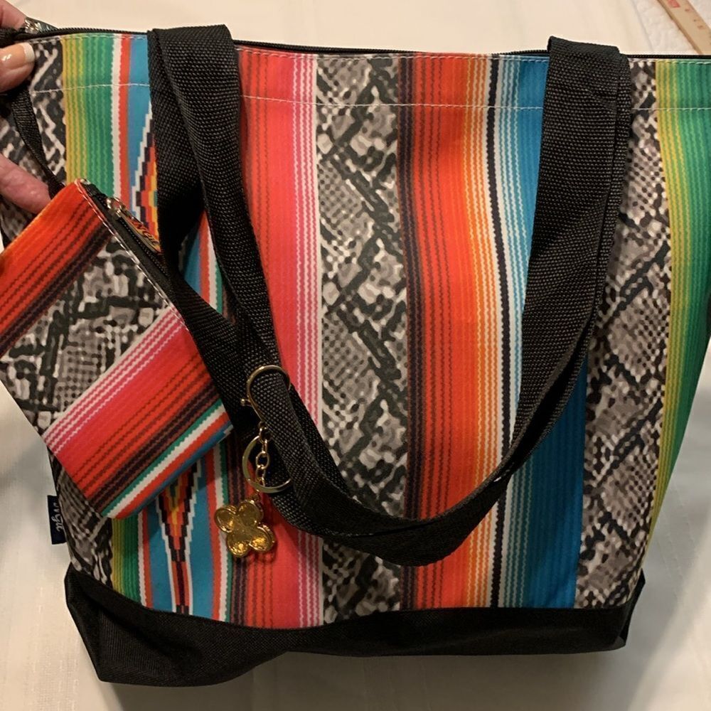 Ngil multi color zipper top closure tote with coin bag & keychain.  Used once